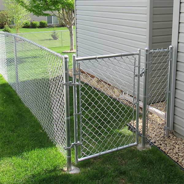 A chain link backyard fence