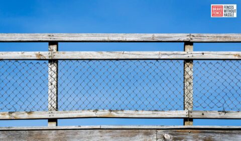 chain link fence with wood posts